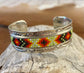 Beautiful unique stamped Nickle sliver and signed by Native American artist silversmith inside of the cuff band. Aztec seed beaded bright colorful Nickle silver cuff bracelet.   Size: 5” inches inside measurement - gap 1-1.5” inches  The Texas Queen Aztec Beaded Cuff