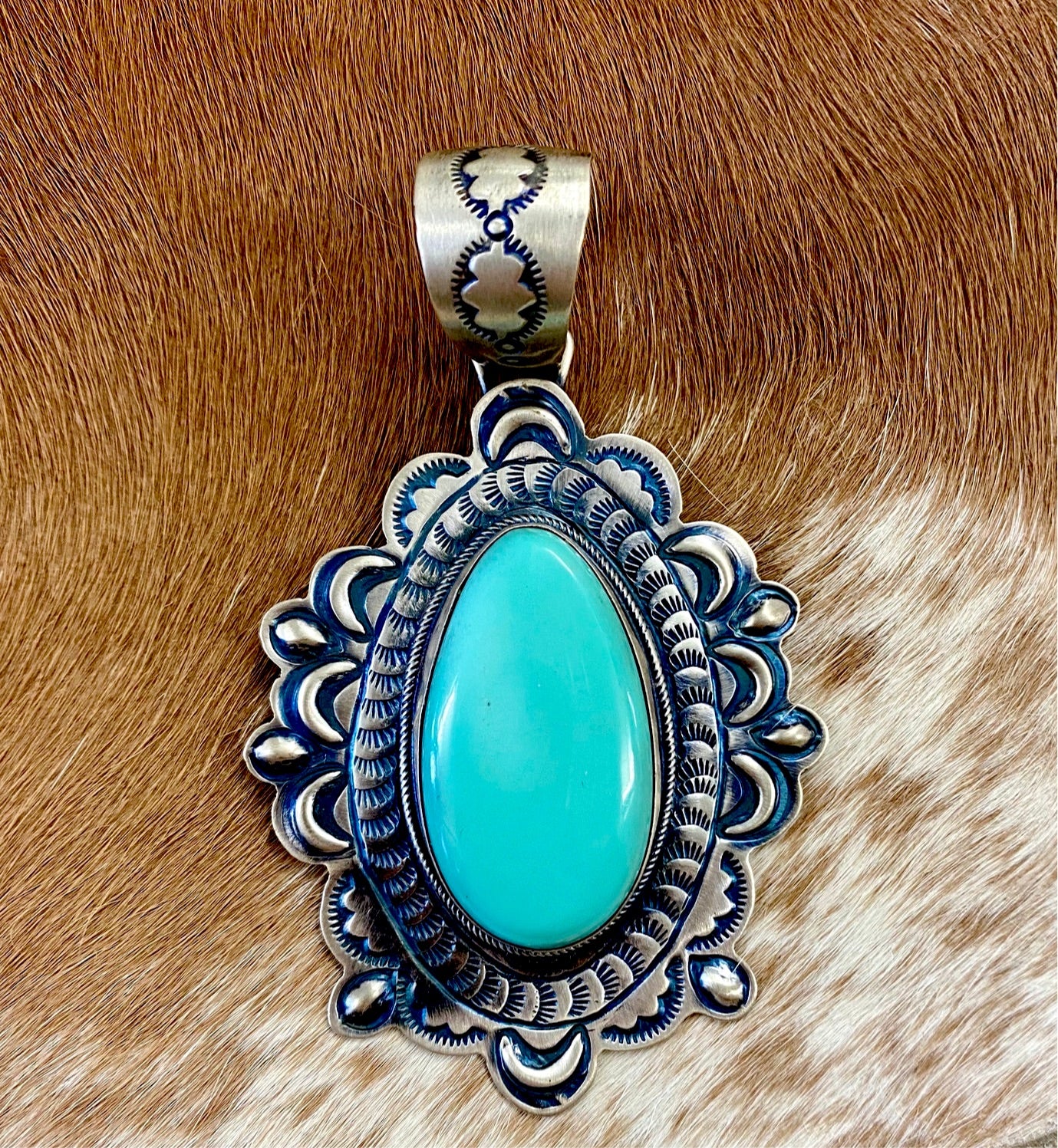 The BRD Turquoise Pendant - Ny Texas Style Boutique Stamped sterling and signed BRD by Navajo Native American artist and silversmith Raymond Beard single large oval shape turquoise sterling silver stone pendant.