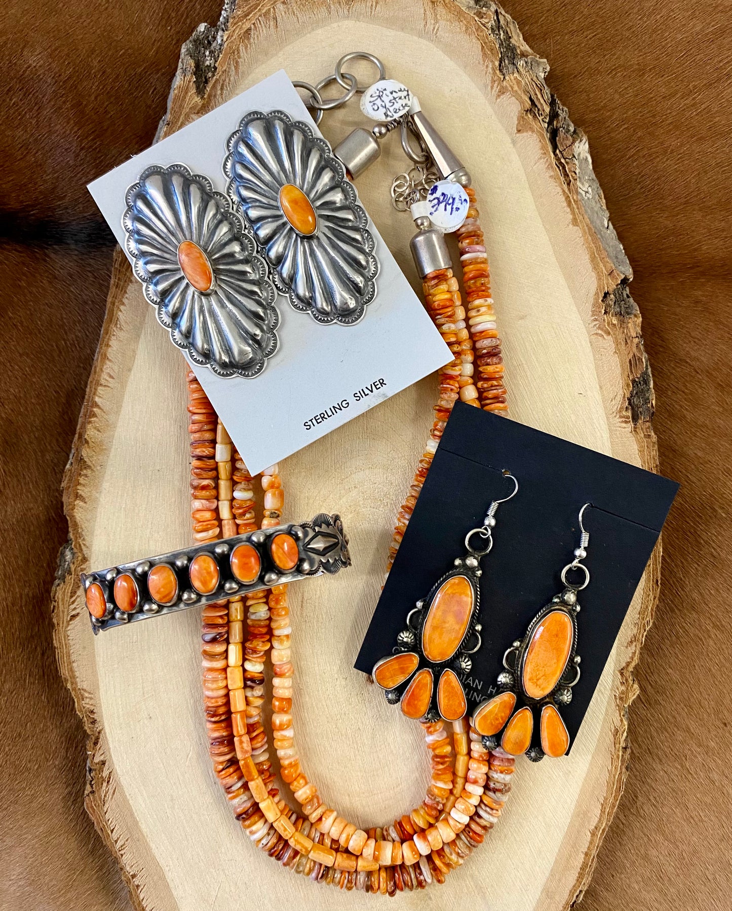 The Unrung Orange Spiny Earrings By Rita Lee