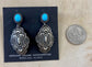 The D. Cadman Turquoise Earrings - Ny Texas Style Boutique Turquoise post sterling silver dangle statement earrings, signed and made by Native American artist silversmith Darrell Cadman. These beauties are Native made stamped sterling and signed "D. Cadman" on the back.   Size: 1.75” Inches length  Stone: Turquoise   Signed: YES "D. Cadman"  Artist/Hallmark: Darrell Cadman 