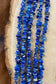 Absolutely stunning sterling silver clasp five strand hand strung blue Lapis and heishe 27” inch length necklace. The shades of blue in this piece are out of this world amazing! This necklace will make a statement with any outfit.   Size: 27" Inches Length   Stone: Blue Lapis 