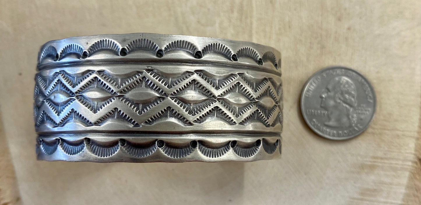 Silver Very Detailed Unique Cuff Made By Native Artist Freddie Maloney Sterling silver very detailed all silver authentic Native made cuff by Native American artist silversmith Freddie Maloney. The perfect piece to wear daily or for a special occasion. Dress this stunning cuff up or down depending on what style you are going for. Stamped sterling and signed Maloney inside of the cuff. 