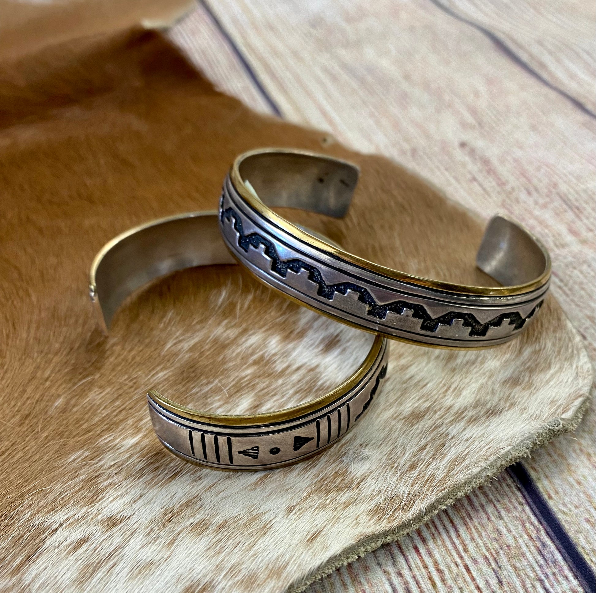 This collection of Navajo-made jewelry includes pieces of original Tommy Singer jewelry pieces. Stamped sterling and signed with Tommy Singer jewelry hallmark. Add a piece of Tommy Singer Native American jewelry to your jewelry collection today! Beautiful Tommy Singer jewelry for sale. Tommy Singer Navajo jewelry is the perfect gift!