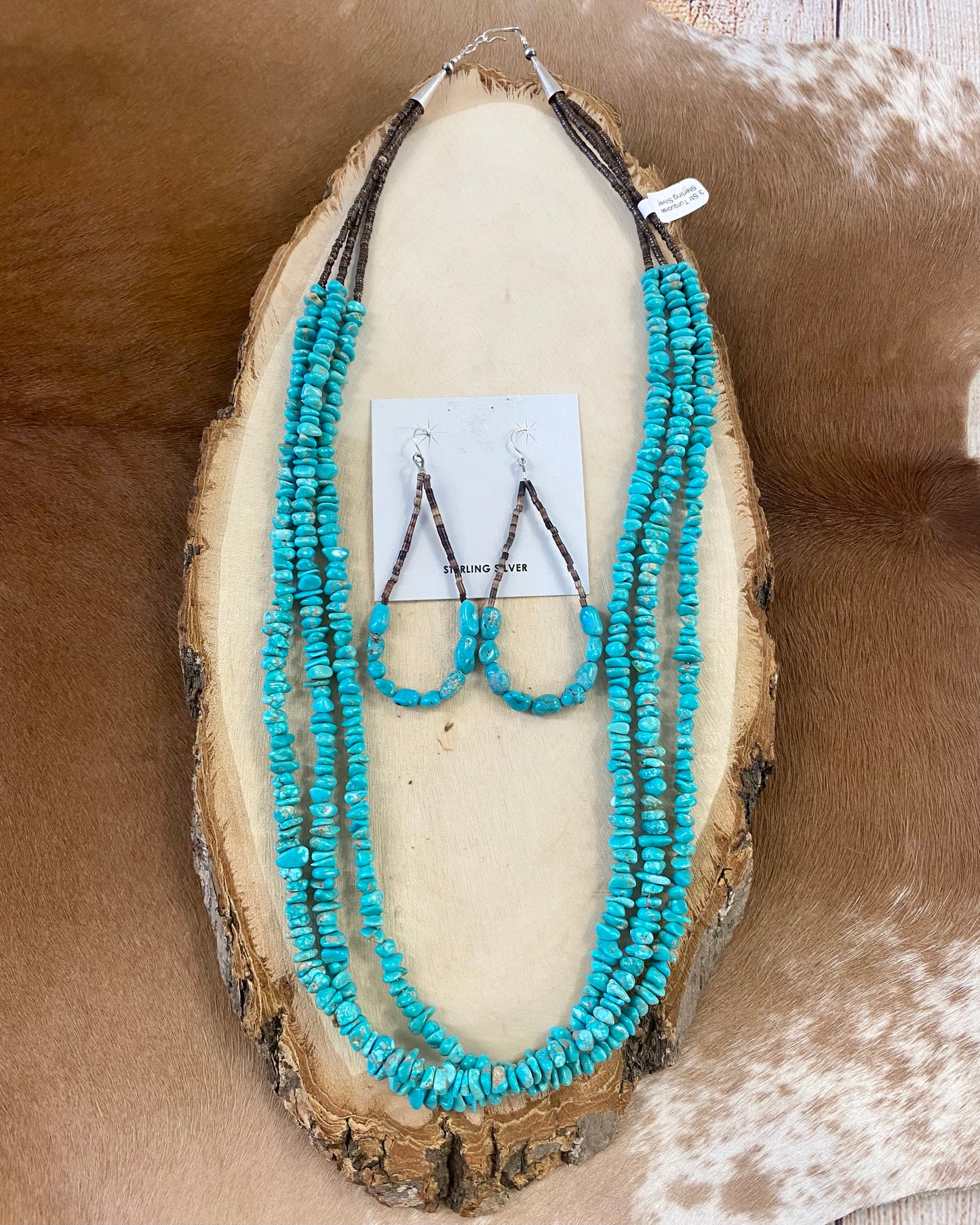 This handmade 25” inches long length necklace is an absolute beauty. A stunning three-strand turquoise beaded necklace with brown heishi beads. Layer it or wear it alone or add a pendant to keep your look totally unique. The perfect dainty layering piece! Simple, yet striking!   Size: 25” Inches Length   Stone: Turquoise 