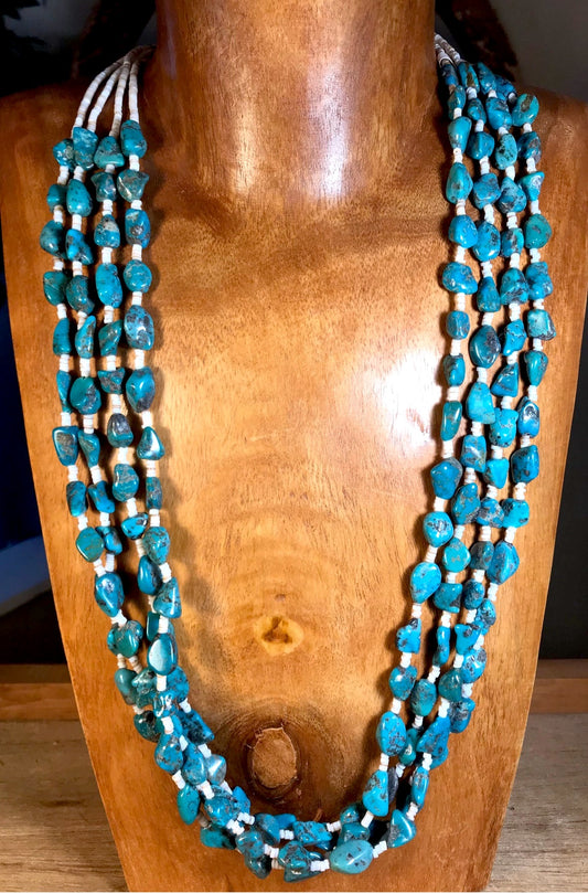 The Sherry 4 strand Turquoise Necklace - Ny Texas Style Boutique Four strand Native made 30" inch length turquoise and heishi sterling silver necklace. The perfect piece to layer alone or with other necklaces. Size: 30" Inches Length Stone: Turquoise | Turquoise Native Made Sterling Silver Necklace, Western Necklace Jewelry, Boho 30" Inches Length Necklace, Cowgirl NFR Rodeo Jewelry