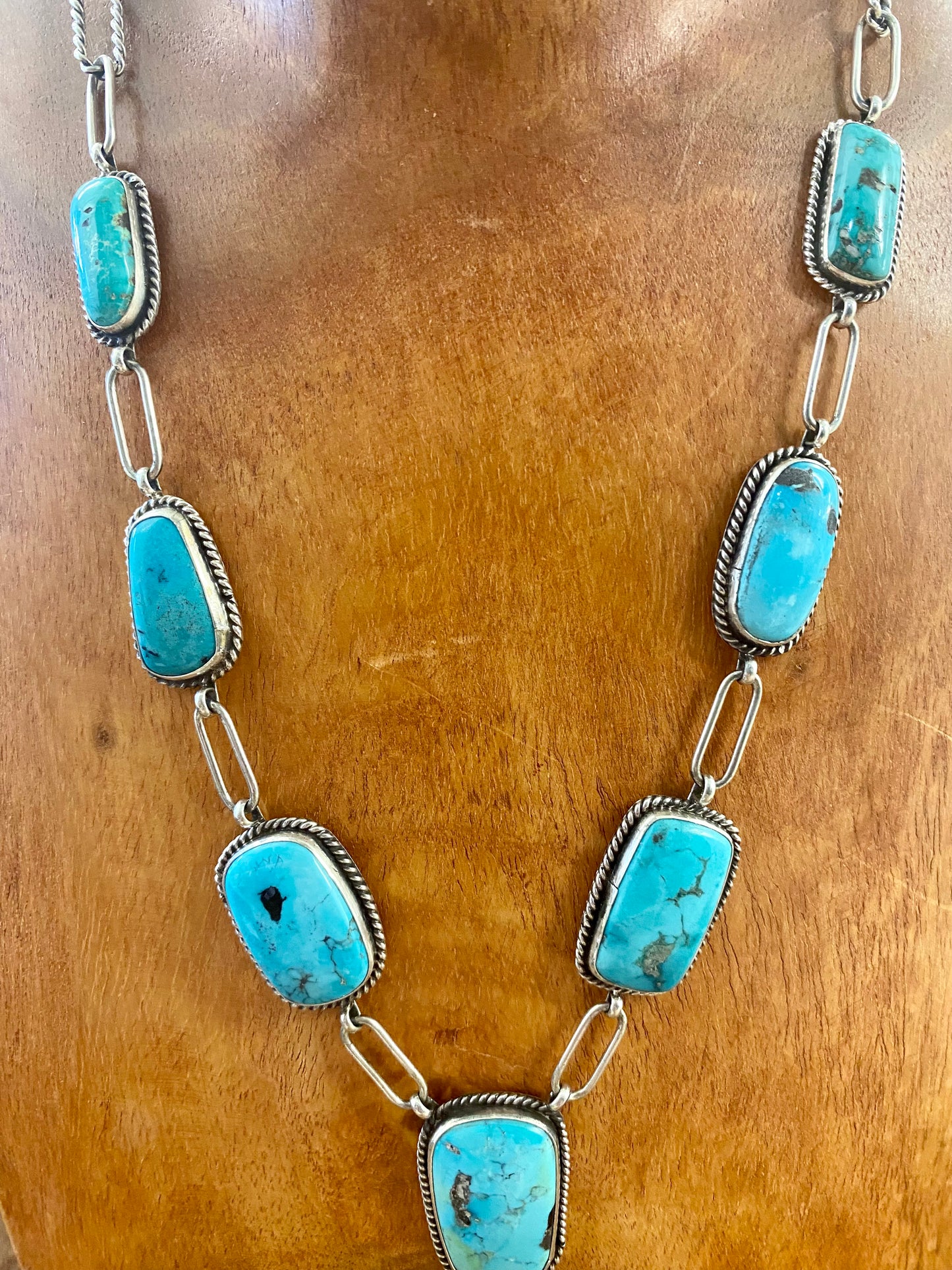 Stunning Morenci turquoise lariat style sterling silver Native American-made statement 31" inches length necklace. The perfect necklace to gift to your loved one or keep for your own jewelry collection! This piece is stamped sterling and signed "K" by the talented Native artist Karlene Goodluck.   Size: 31” inches in length   Stone: Morenci Turquoise  Signed: YES "K"  Artist / Hallmark: Karlene Goodluck