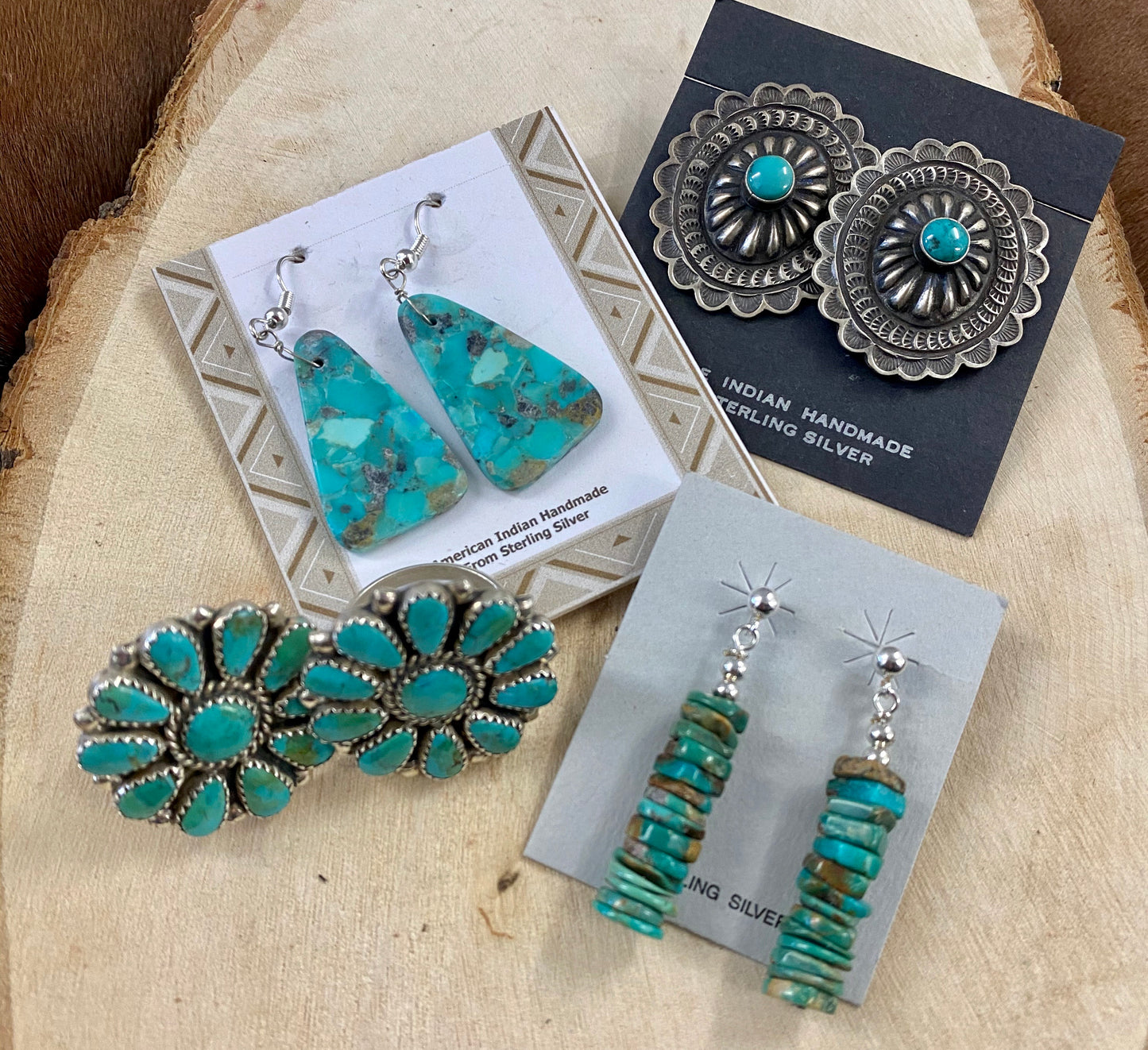 Native American Made Sterling Silver Concho Earrings With Turquoise Authentic large post concho style sterling silver earrings with turquoise. Stamped sterling and signed by Native American artist silversmith on the back inside the indent of the earrings. 