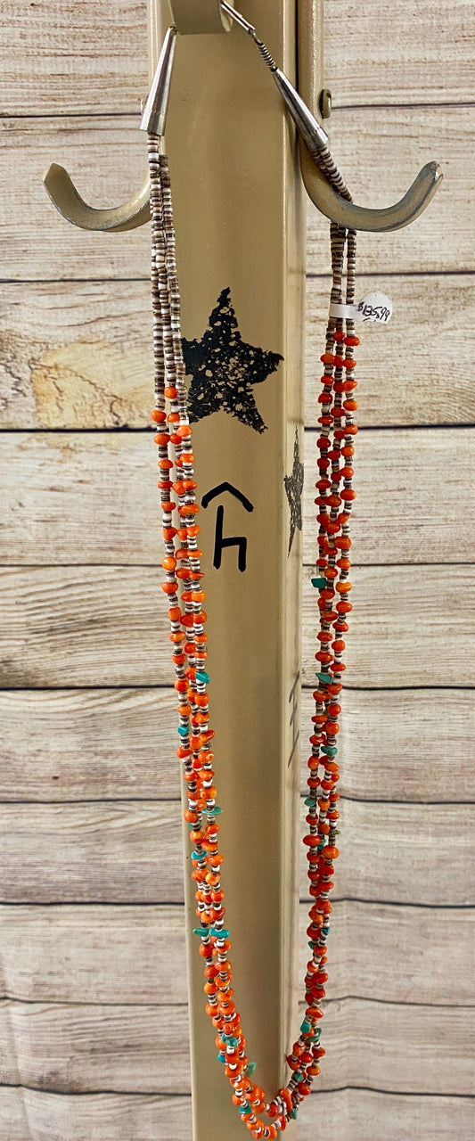 The Ouray Necklace - Ny Texas Style Boutique Stunning and authentic triple strand sterling silver necklace featuring Coral, turquoise, and heishe. This Native American made necklace is long but you can make it longer if desired by adding a beautiful pendant to it or you can wear it layered with another necklace. The options for the necklace and outfits are endless! Adds the perfect pop of color to your jewelry collection. Size: Length: 32” Inches