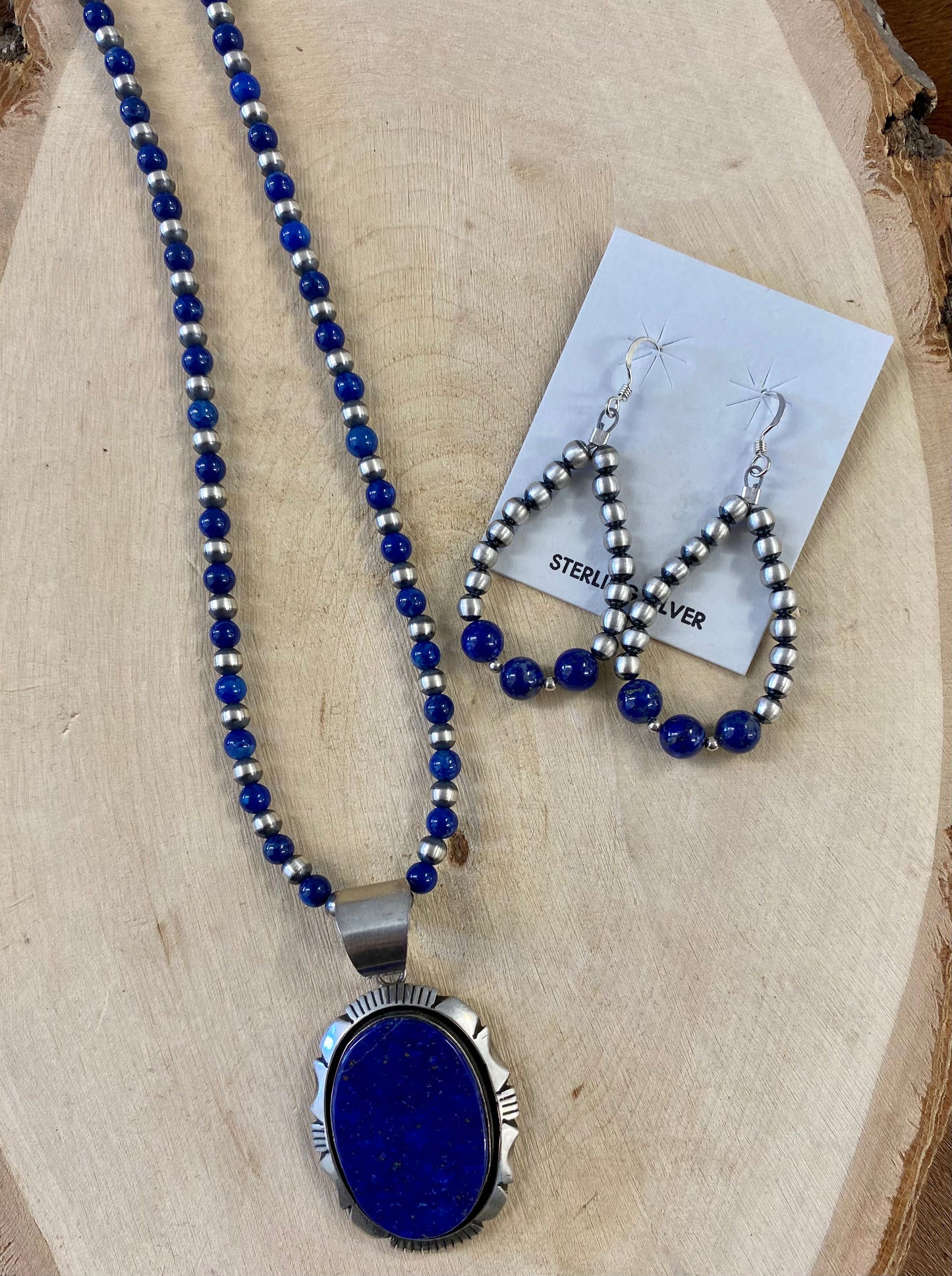 Unique handmade Native American Made Sterling Silver Blue Lapis Lazuli Jewelry. Everything from Lapis Necklaces, Lapis Rings, Lapis Pendants, lapis lazuli men's jewelry, and more. The perfect blue lapis accessory for any jewelry collection. Native-Made Jewelry For Sale. Lapis Earrings, Lapis Necklaces, Lapis Pendants, Lapis, and Navajo Pearl Jewelry.