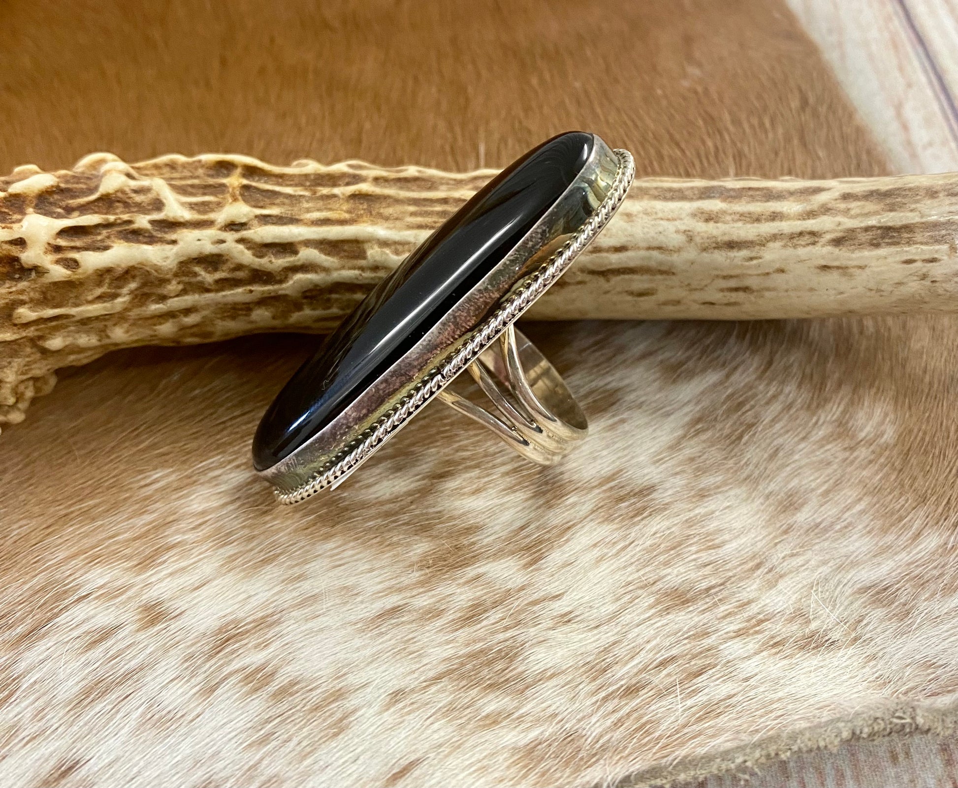 Large sterling silver onyx single stone handmade statement size 9 ring. Stamped sterling and signed RT artist silversmith on the back of the ring. The perfect unique piece of jewelry to add to your next outfit!   Size: 2” inches length x 3/4” inch width   Ring Size: 9  Signed: YES "RT "  Stone: Onyx