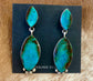 ﻿Stunning post sterling silver statement turquoise native made earrings. Stamped sterling and signed "SW" by Native American artist silversmith Selena Warner. The perfect piece to add to your jewelry collection or gift to a loved one!   Size: 2.5” inches length x .75” inch width   Signed: YES "SW"  Hallmark/Artist: Selena Warner   Stone: ﻿Turquoise 